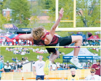 Caleb McDonald clears 6 feet in the high jump to place fifth at the NDHSAA Class B State Track and Field Meet. Photo by Larry Stokke