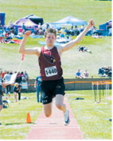 TJ Henderson competes in the triple jump at the NDHSAA Class B State Track and Field Meet, recording a leap of 40 feet, 7¾ inches. Photo by Larry Stokke