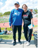 Former Langdon track and field coach Denny Dinius stops by the Cardinals’ camp to congratulate head coach Jane Hart on another successful season at the NDHSAA Class B State Track and Field Meet. Photo by Larry Stokke