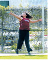 Christine Joyner competes in the discus at the NDHSAA Class B State Track and Field Meet, recording a throw of 121 feet, 1 inch, earning her ninth place. Photo by Larry Stokke