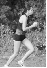 Langdon Area-Munich’s Olivia Lorenz competes in the cross-country meet Tuesday, Aug. 25, in Northwood, finishing with a time of 23 minutes, 26 seconds. Photo by Larry Stokke