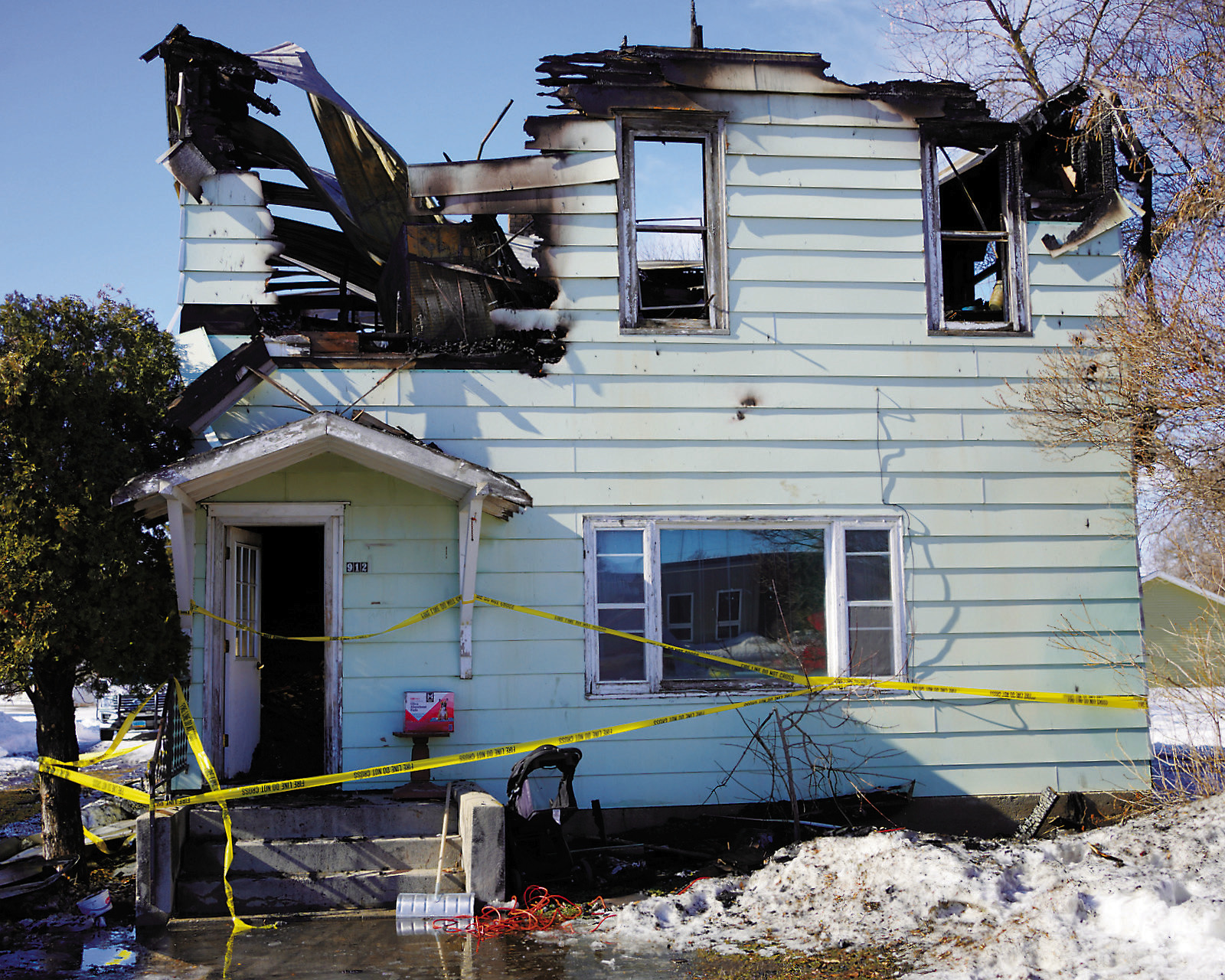The building stands the day after the fire. Photo by Larry Stokke.