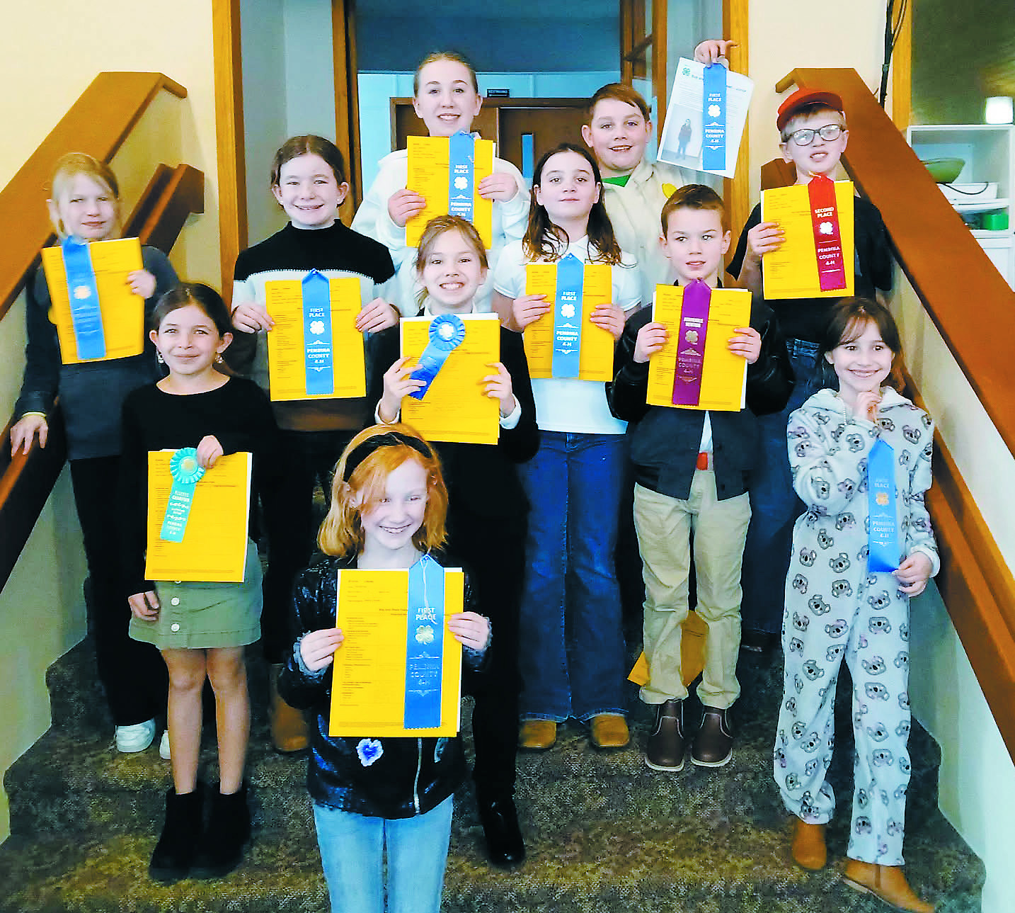 Junior Buy and Show: Front row (L-R): Ava Morrison, second row: Brinxlee Hay, Olive Truver; third row: Sadie Halverson, Adlee Hay, Amelia Ratliff, Olive Moore, Caleb Bailey; fourth row: Pyper Shane, Rylan Moore, and Levi Norrell.