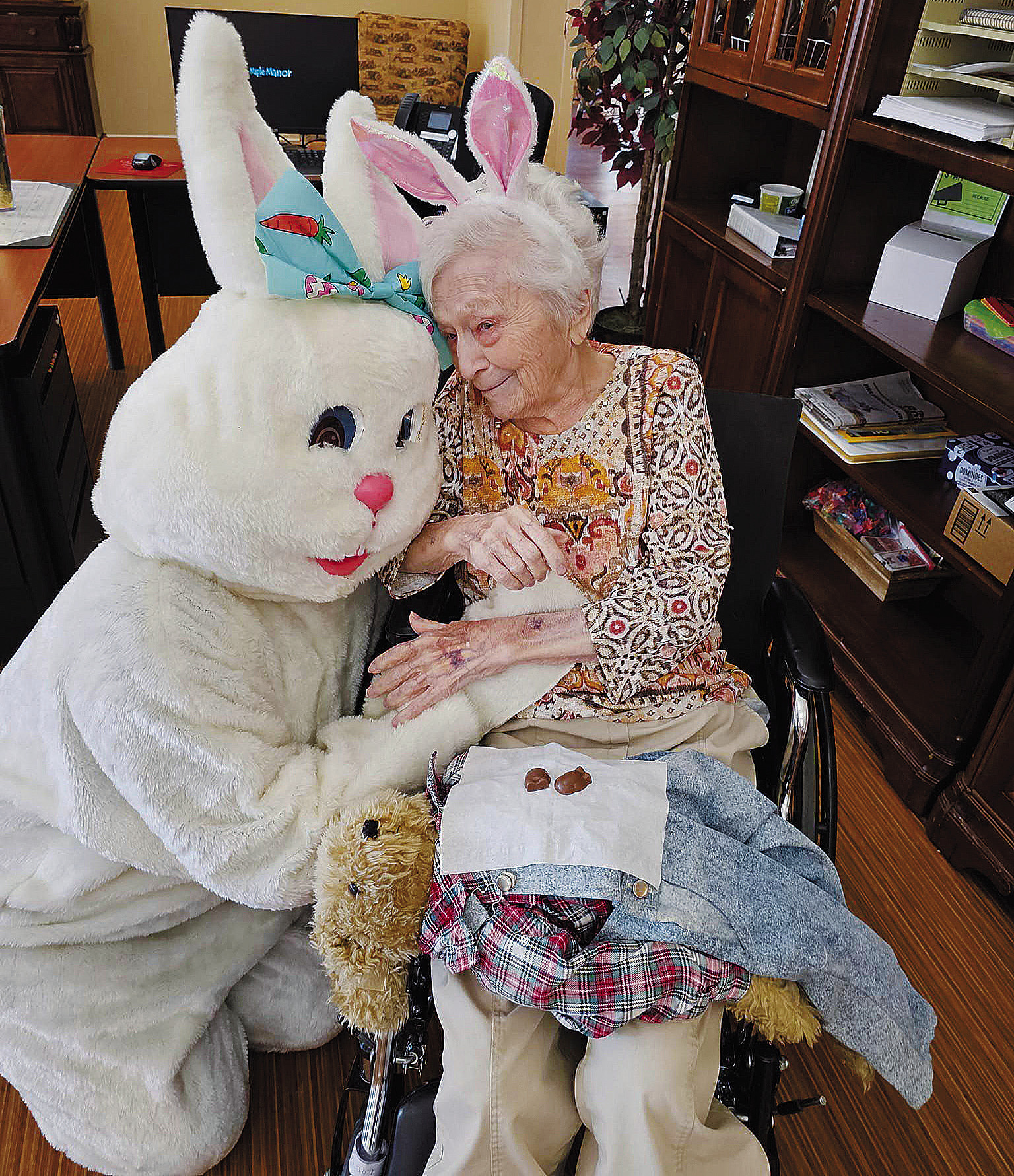 The Easter Bunny made his annual stop at Maple Manor Care Center in Langdon. Not only did he bring chocolate treats for residents and staff, he also delivered hugs and love to everyone. Pictured is the Easter Bunny with Dorine. For more photos of the Easter fun, see the Maple Manor Care Center Facebook page.