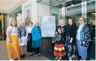 Members of the Charbonneau family pose outside of Walter Reade Theater with young family friend and first-time actress Juanita Selwyn of Yankton Sioux Tribe. Submitted photo