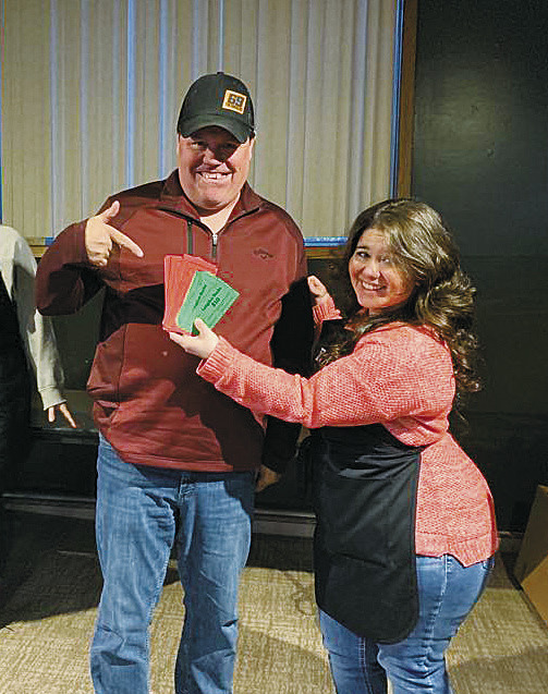 Stoney Kruk was the Grand Prize winner. He is pictured here with Jessica Tull, Langdon Area Chamber of Commerce executive director.