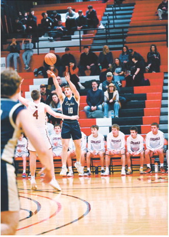Colton Bailly puts up a shot in Devils Lake on Monday night. Photo by Ashley Schafer