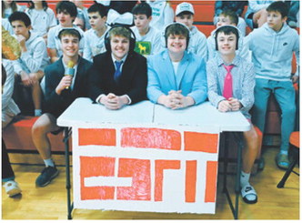 The North Border student section gets into the tournament action! Pictured are Oakley Brown, Gavin Symington, Parker Stremick, and Asher Crosby. Photo by Ashley Schafer