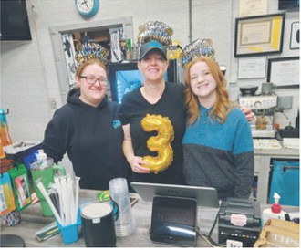 The Cure owner, Sara Price, pictured with her daughters, Makenna and Grace Follin. Submitted photo.