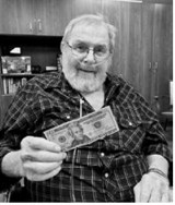 Clair Longtin shows off his winnings from Bingo Bonanza. Submitted photo.
