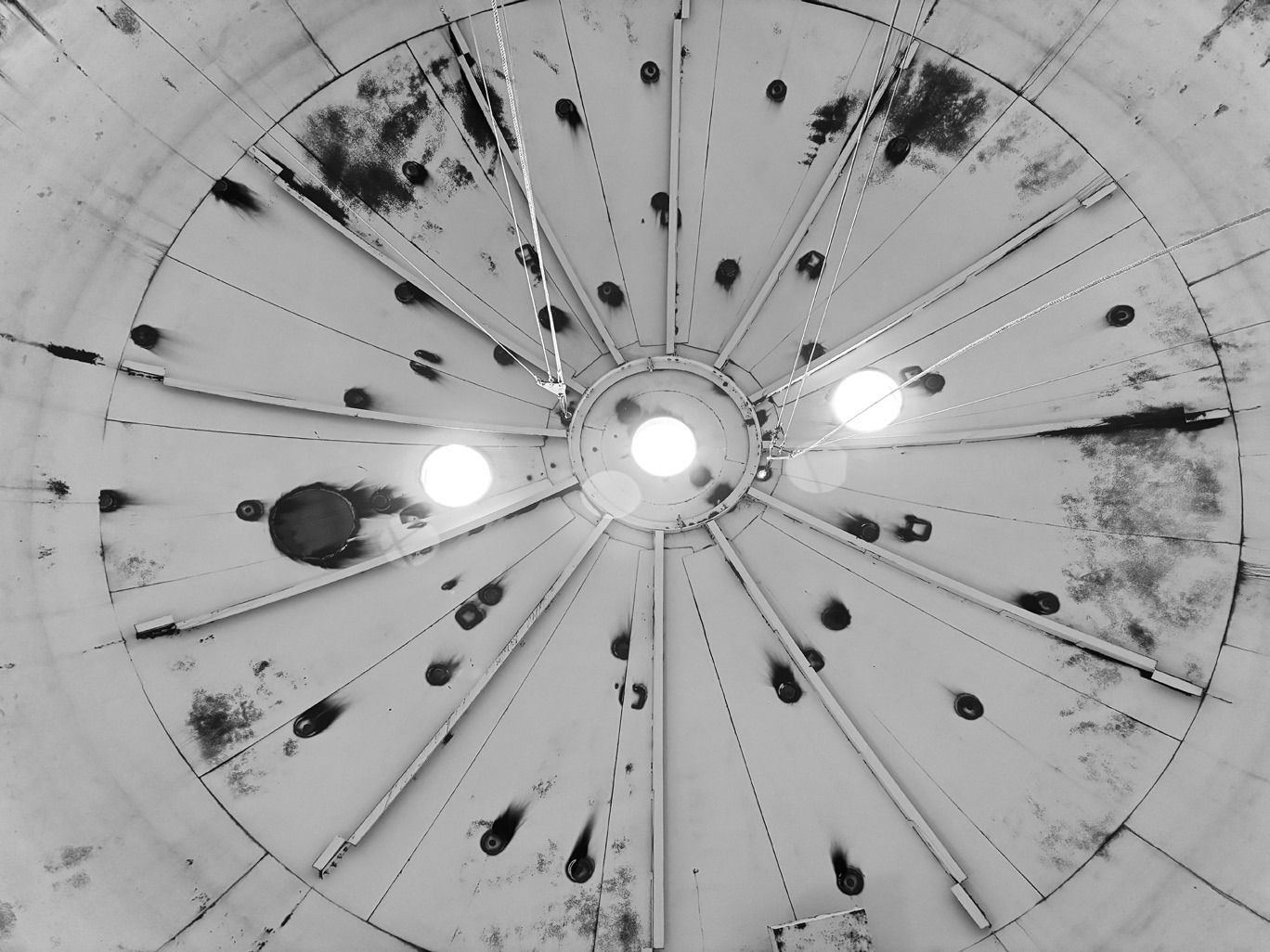 Standing at bottom of inside the water tower tank and looking straight up.