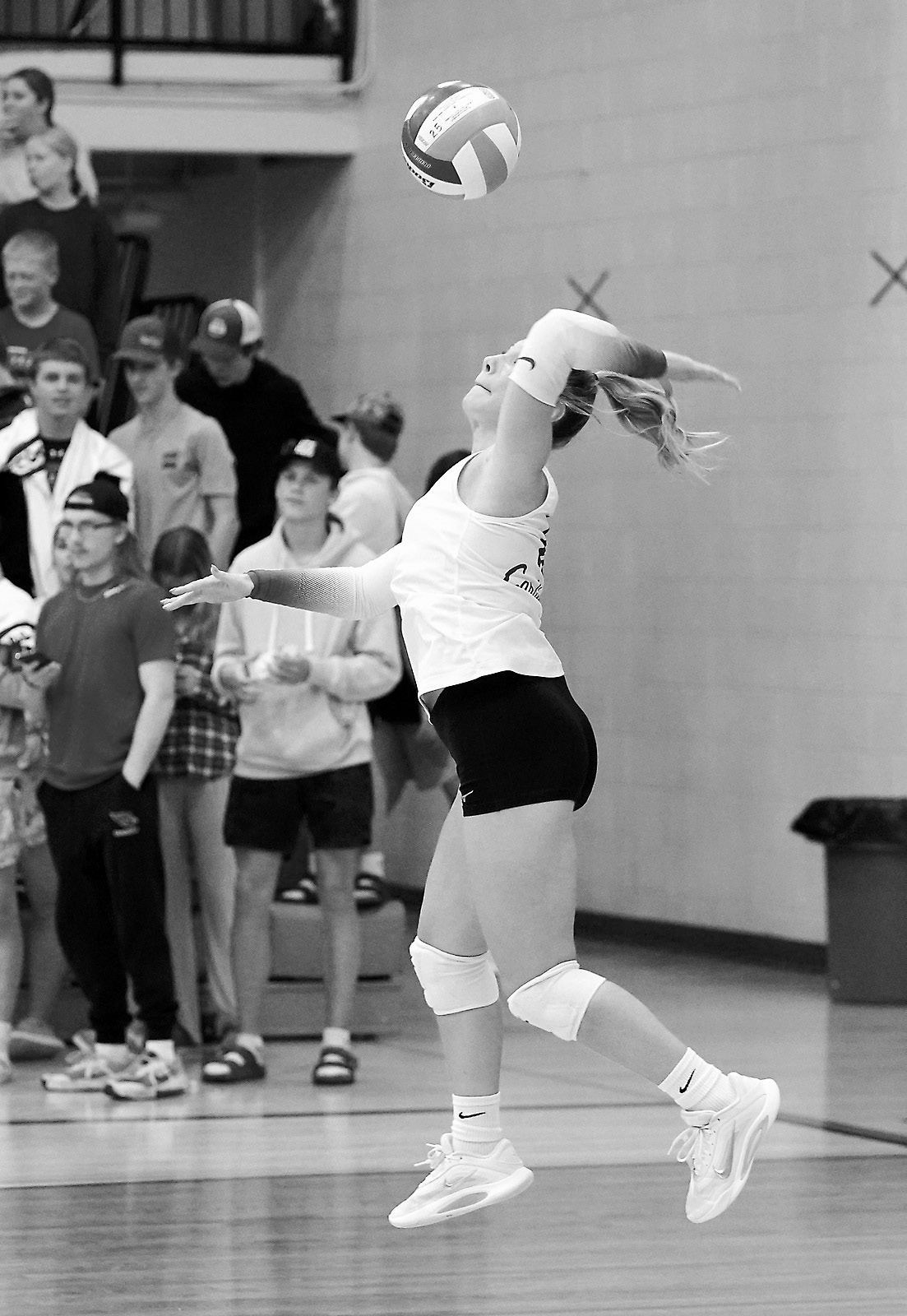 Raeleigh Ratzlaff serves an ace against the Eagles in Langdon on Sept. 18. Photo by Larry Stokke.