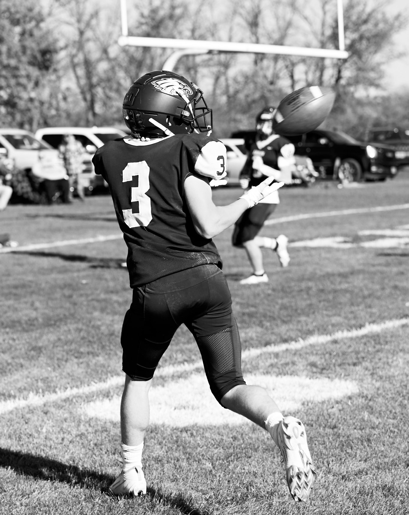 Oakley Brown successfully catches a pass and completes a touchdown. Photo by Ashley Schafer.