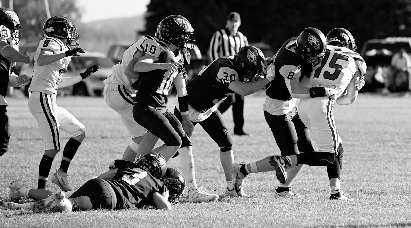 Garret Willits puts a stop to the Mustang's advance. Photo by Ashley Schafer.