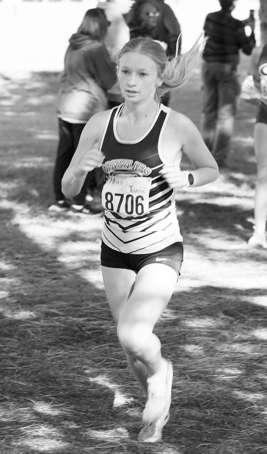 Emerson Helgoe placed 21st, qualifying her for the state cross country meet in Jamestown on Oct. 25. Photo by Larry Stokke.