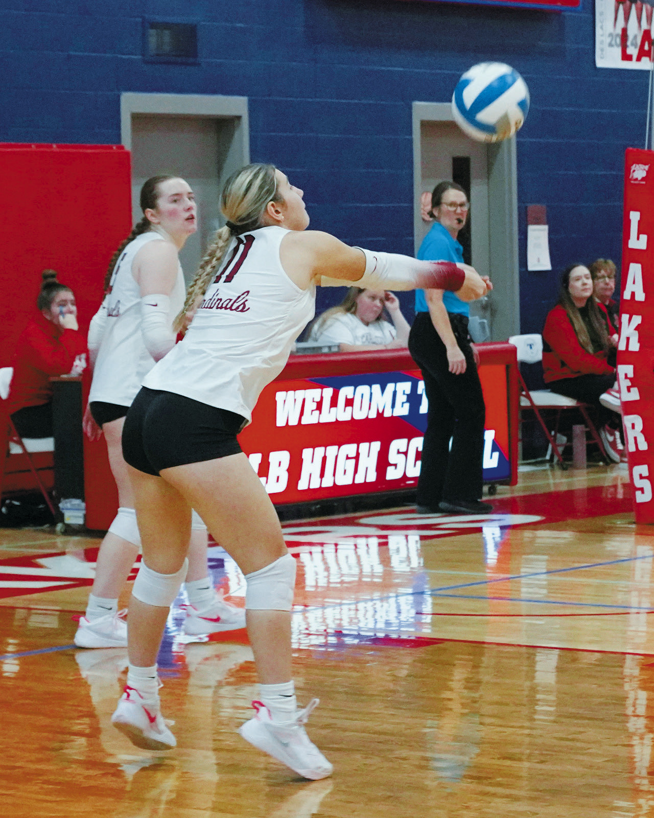 Raeleigh Ratzlaff with a pass to the front row. Photo by Larry Stokke.