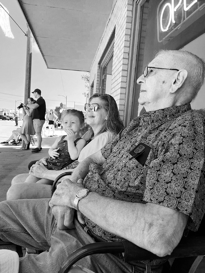 Grandpa, aunt Nancy, and cousin Charlotte enjoying Walhalla’s Parade.