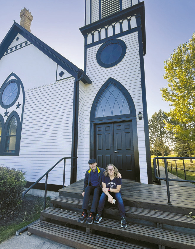 Hörður Gunnarson and Kristín Jóhannsdottír visiting Hallson Lutheran Church at Icelandic State Park.