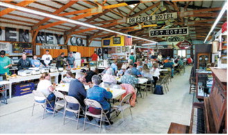 Community gathering: Visitors fill the Dresden Museum during the Cavalier County Historical Society's Father's Day Breakfast on June 21. Preliminary attendance numbers approached 700 as guests enjoyed breakfast, toured exhibits and visited with friends and neighbors throughout the morning. Photo by Larry Stokke