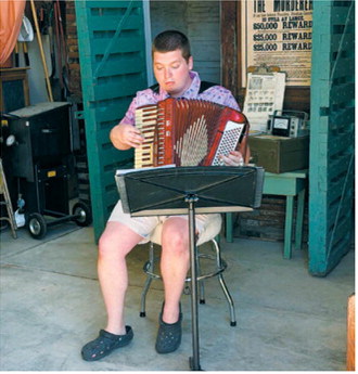 Musical entertainment: Lane Lindseth provided musical entertainment during the Cavalier County Historical Society's Father's Day Breakfast at the Dresden Museum. Submitted photo