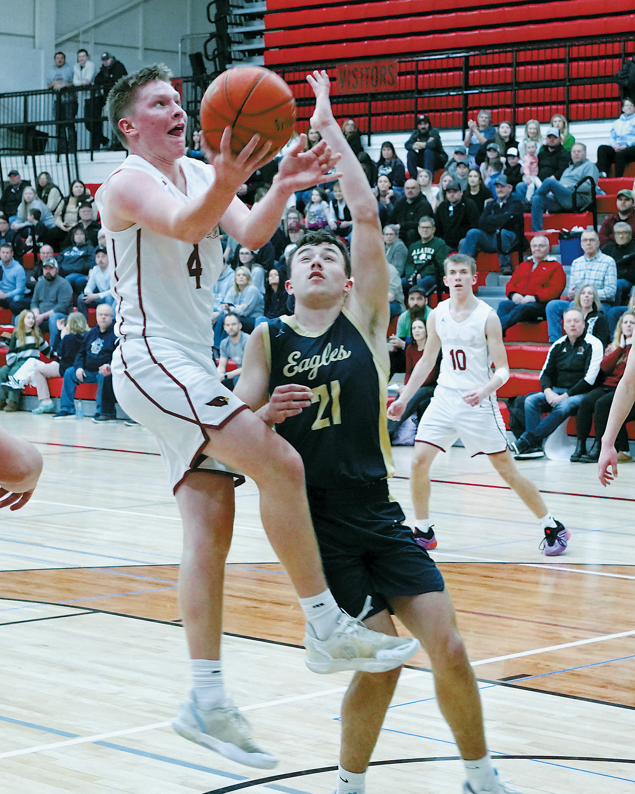 Levi Swanson had a great game with two 3-point baskets, finishing with 12 points total. Photo by Larry Stokke.