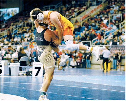 Aiden Werner powers his man off the mat and won his match with a pinfall. Photo by Larry Stokke