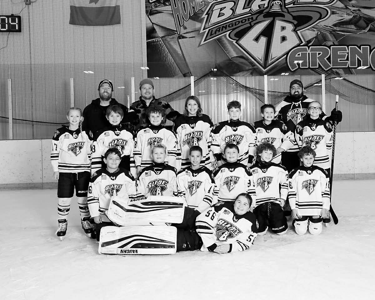 Coaches: Tyler Balsdon, Cale Borho, Tanner Romfo. Back row L-R: Addi Gaffke, Jamison Balsdon, Clint Crump, Brooklyn Mondor, Beau Busse, Hudson Romfo, Addison Schill. Kneeling L-R: Griffin Hoffman, Maverick Mostad, Braxton Mondor, Caden Downs, Warren Olson, Wyatt Crump. Front: Goalie- Lizzie Hakanson. Submitted photo