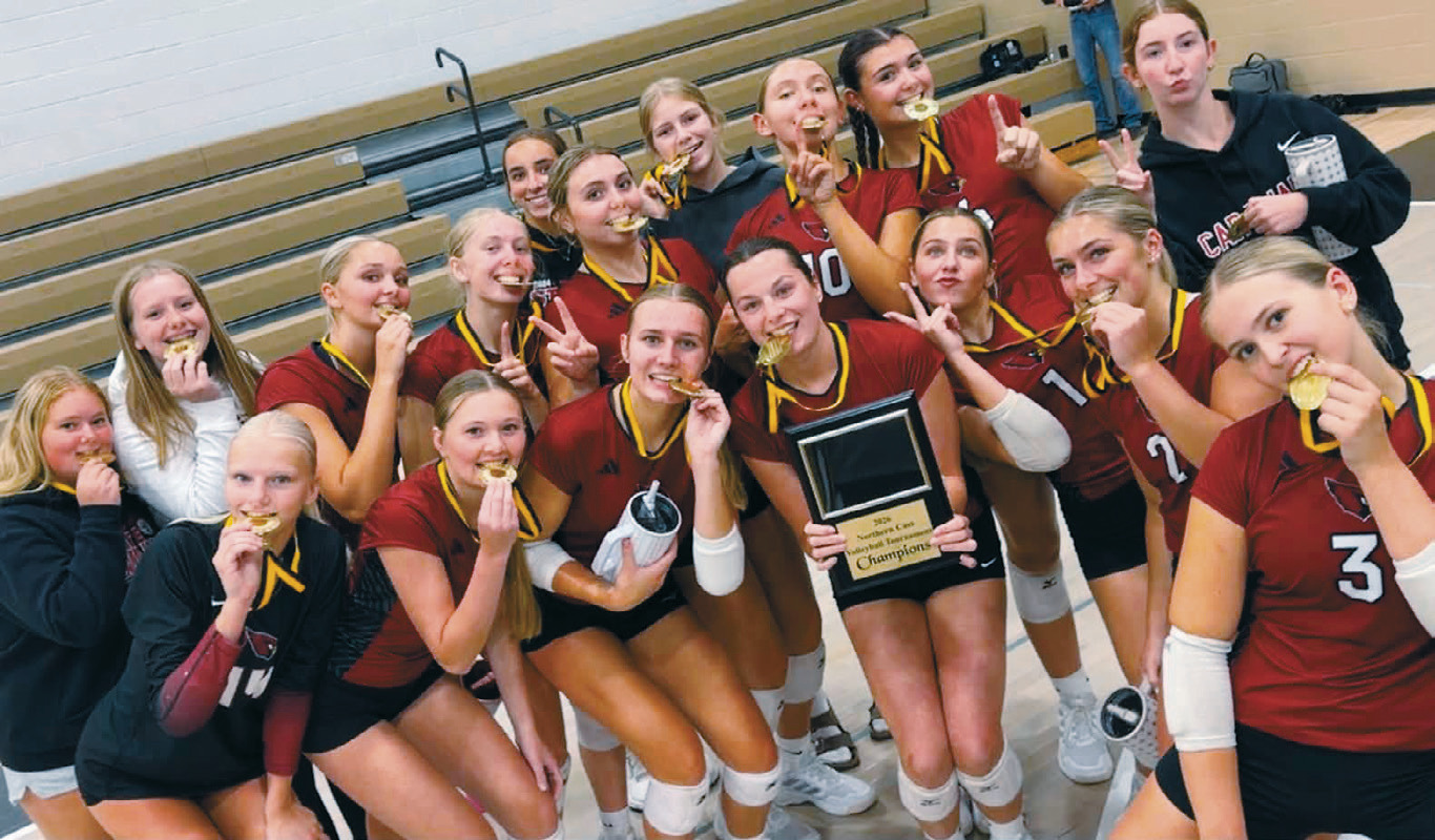 The Langdon Area-Munich Cardinals celebrate after winning the Northern Cass Tournament on Aug. 29. Submitted photo
