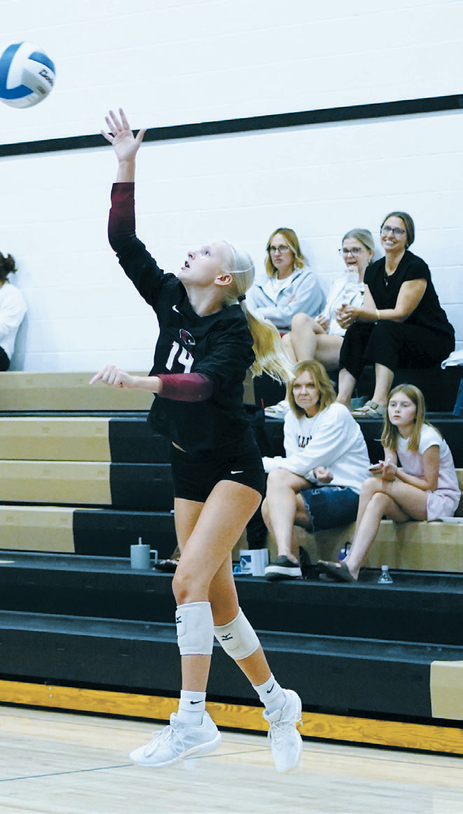 Mya Swanson delivers a jump serve during the Northern Cass Tournament on Aug. 29. Photo by Larry Stokke