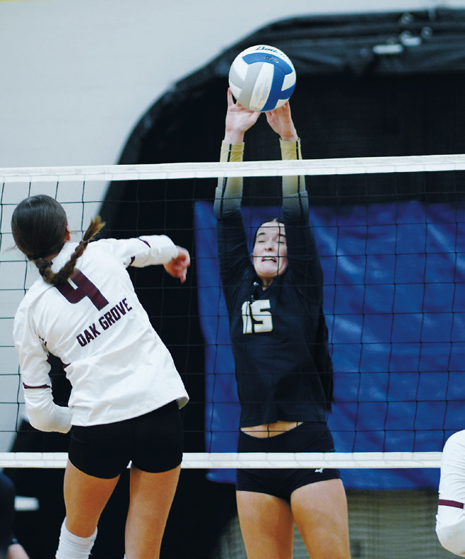 Tia Huguley goes up for a block during the Northern Cass Tournament on Aug. 29. Photo by Larry Stokke