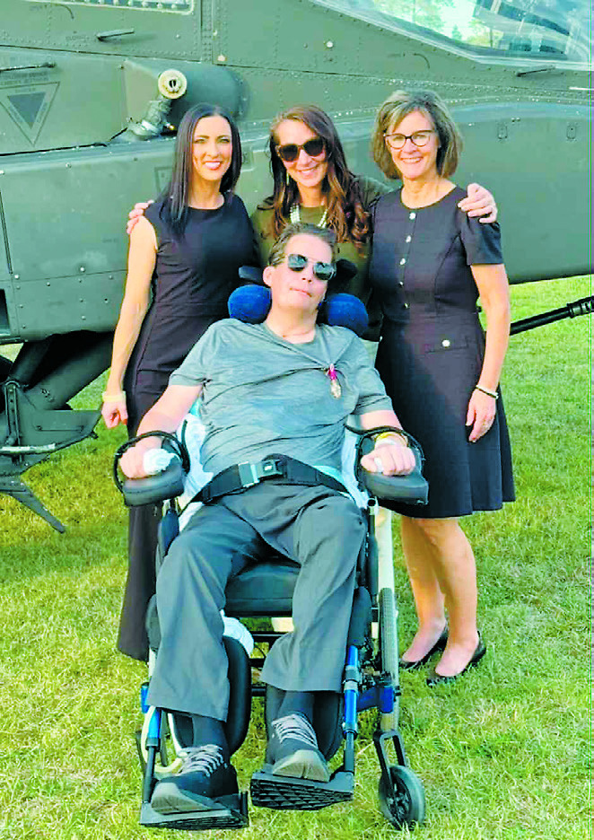 From (L-R) Erika Stein, Lorna Illerbrunn, and Lori Stein with Garrett at his Final Flight Ceremony. Submitted photo.