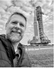 Chris Johnson takes a selfie during the rollout of the Artemis II Space Launch System rocket and Orion spacecraft at Kennedy Space Center in Florida. Artemis II is NASA's first crewed mission around the moon since the Apollo era. Submitted photo
