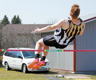 Garret Willits placed 5th, clearing 5'2' in high jump at the Langdon Invitational. Photo by Larry Stokke.