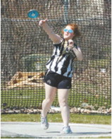 PCN's Grace Follin throwing discus at the Langdon Invitational. Photo by Larry Stokke.