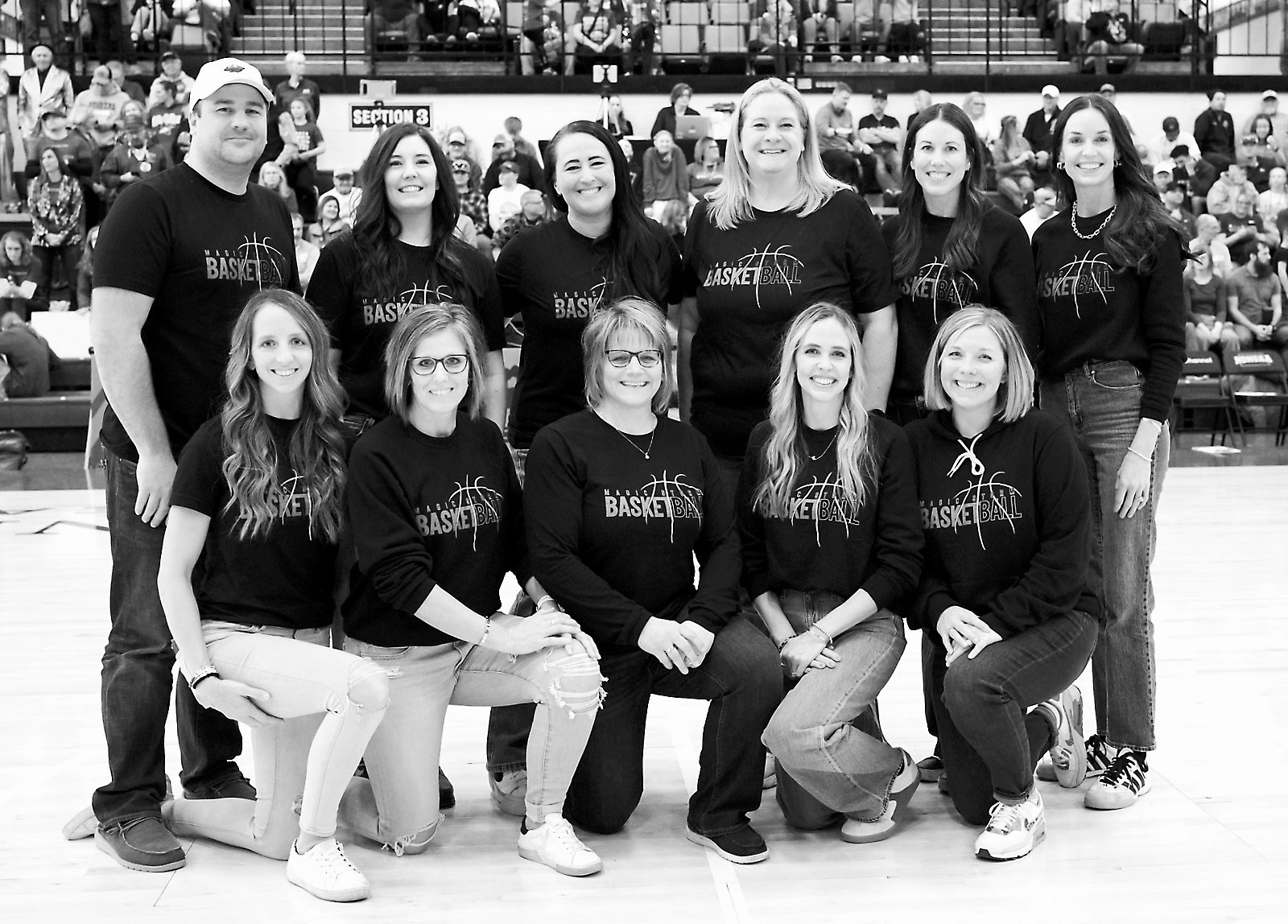 Now, here's the majority of the 2000 Starkweather-Munich Magic Storm Class B Championship team 25 years later. Back row (L-R) Student manager Jonathan Kitsch, Roxanne (Thom) Erickstad, Morgan (Sager) Fee, Karleen (Hoffman) Estenson, Lindsey (Haaven) Gust, Rachel (Beck) Olson; front row, Karla (Beck) Servaty, Assistant Coach Andrea (Kitsch) Hornstein, Head Coach Karla (Kitsch) Kingzett, Monica (Beck) Howard, Sheila (Wass) Schlafmann. Photo by Larry Stokke.