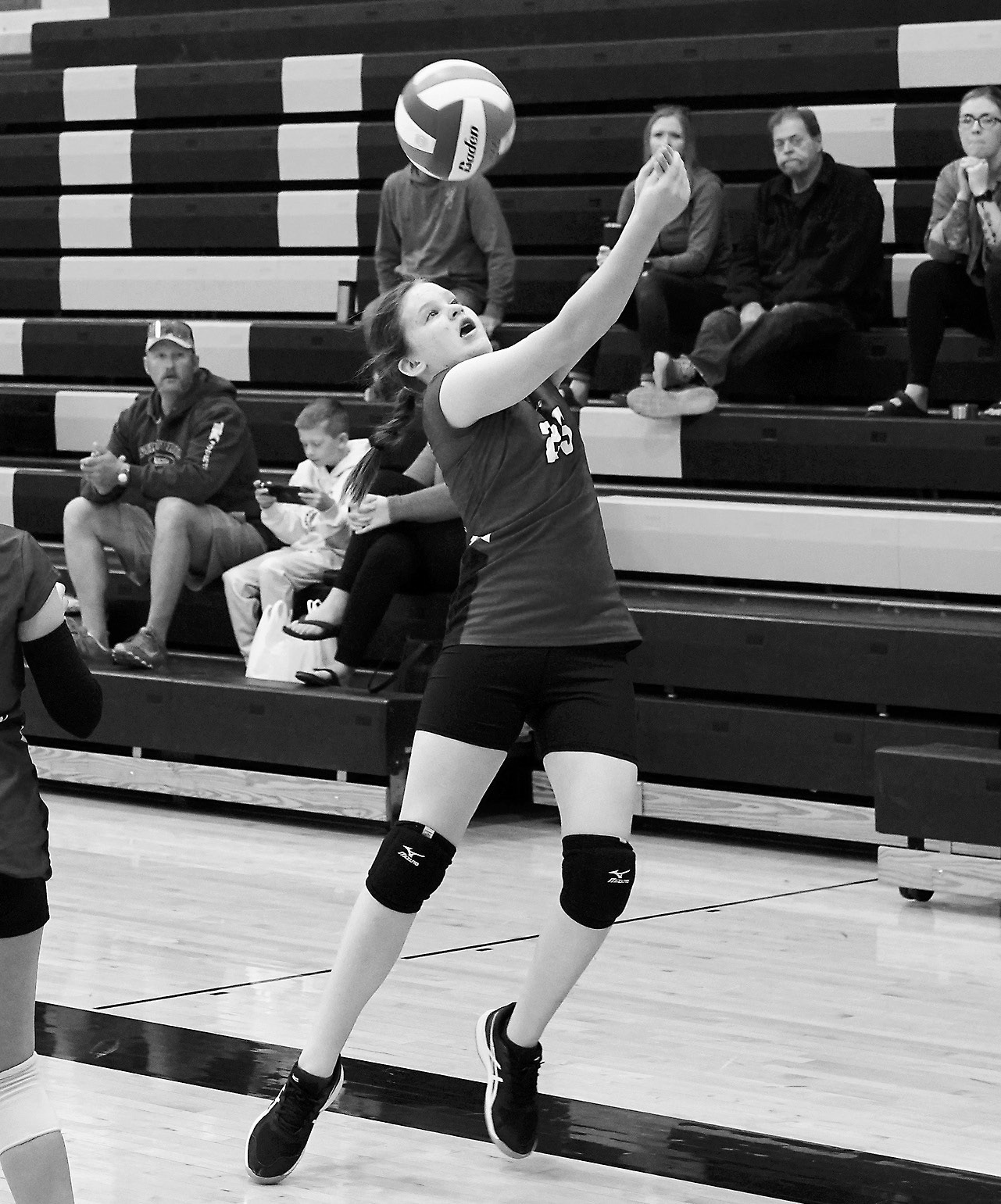 Stella Lawson leaps to make a save and keep the ball in play in Park River on May 3. Photo by Larry Stokke.