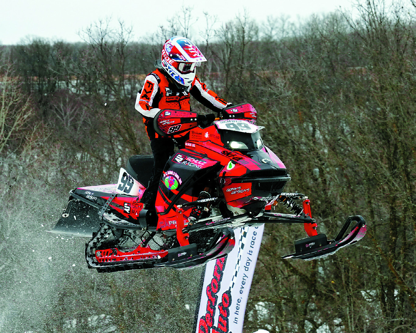 Reid Schultz from Grafton gets airborne going over the last hill on the way to the finish line. Photo by Larry Stokke