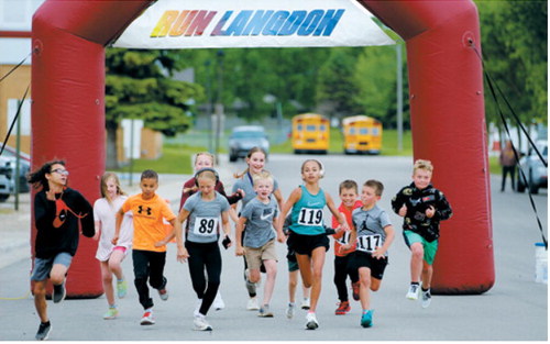 Off and running – young participants burst from the starting line during the kids run at the Run Langdon event June 13 in Langdon. Ten children took part in the race, kicking off a day that also featured a 5K run and community activities. Submitted photo