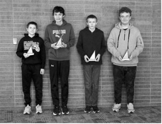 Individual place winners L-R: 1st Place Clay Pankratz from Munich, 2nd Place Mason Brown from Langdon, 3rd Place Aaron Miles from Munich and 4th Place Tristan Thompson from St A's. Photo by Larry Stokke