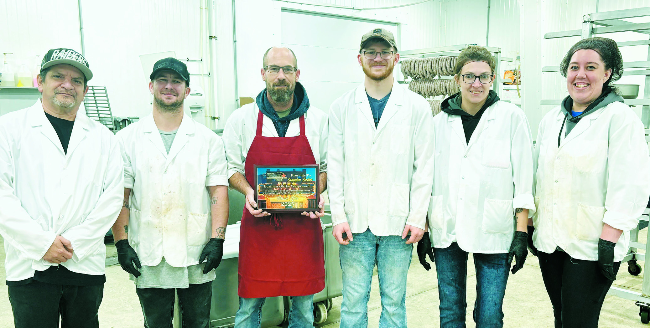 Langdon Locker was named Chamber Business of the Year at the annual Chamber of Commerce Banquet. From (L-R) Tom Aguilar, Dillion McMahon, Josh Metzger, Wyatt Kartes, Danielle Brown, Brittany Dulski (not pictured) Logan Feil, Bob Hall, Tyler Bodnar.