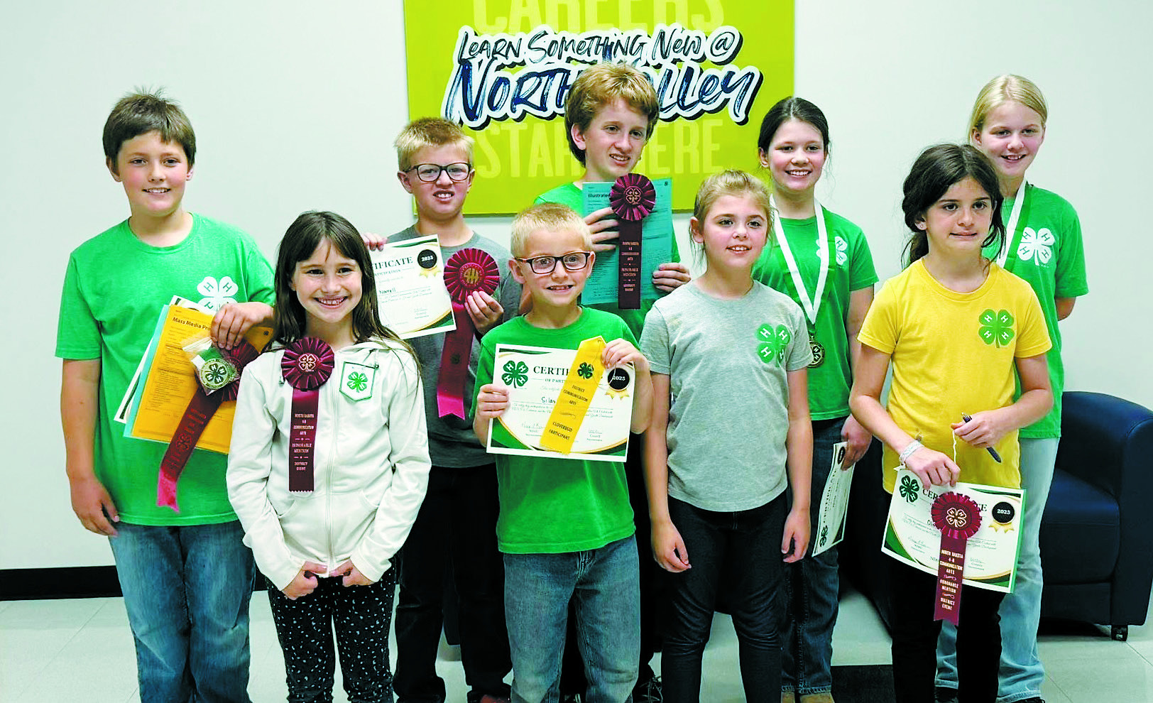 Front row (L-R) Olive Truver, Silas Norrell, Sadie Kennedy, Olivia Olimb; back row: Oscar Hunter, Levi Norrell, Gary Olimb, Chloe Hunter, and Stella Norrell.