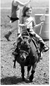 Lyla Gullickson captured first place in her class in the flag race at the Sapa Arena Fun Day. Photo by Larry Stokke