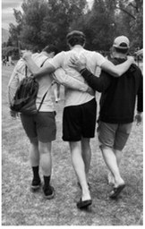 Family members help support Jaxen Johnson as he walks away from the finish line after completing the 52-mile Bighorn Trail Run in Wyoming. Submitted photo