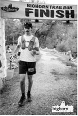 Exhausted but determined, Jaxen Johnson crosses the finish line at the 52-mile Bighorn Trail Run. Submitted photo