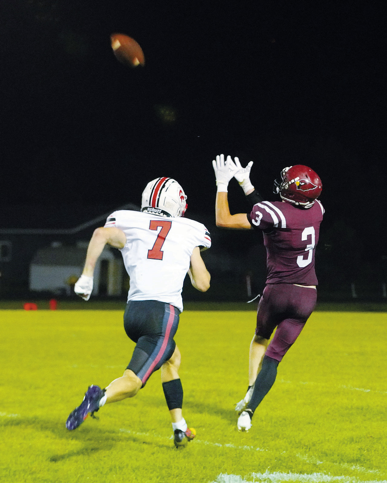 Cody Amble outruns a Central Cass player, securing a catch for the touchdown. Photo by Larry Stokke.