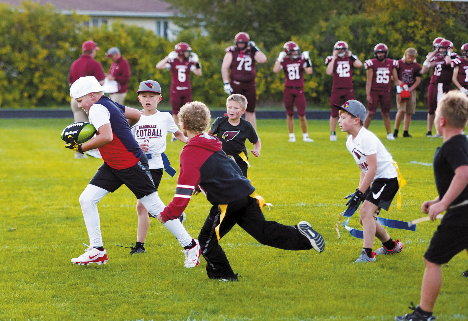 These junior Cardinals put on some halftime entertainment. Photo by Larry Stokke.