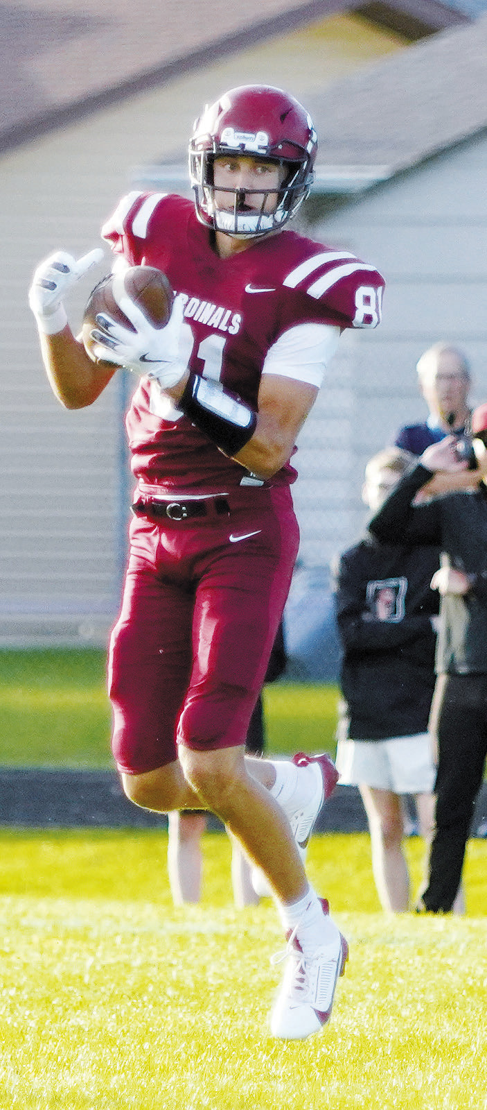 Tanner McDonald with a catch for a first down against Central Cass. Photo by Larry Stokke.
