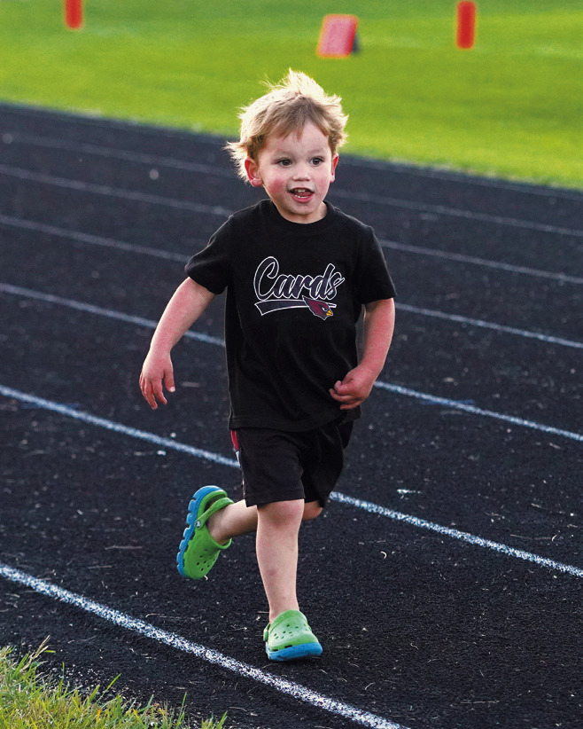 One-hundred meter dash halftime entertainment. Photo by Larry Stokke.