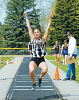 Jaylynn Stegman took 9th place in the triple jump in Larimore. Photo by Larry Stokke.