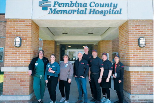 Members of the Rapid Relief Team and local volunteers pose outside Pembina County Memorial Hospital following a staff appreciation event that served approximately 140 hospital employees. Submitted photo